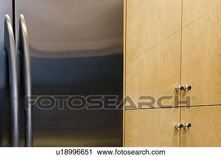 Refrigerator and Cupboards in Contemporary Kitchen View Large Photo Image Stock Image - Refrigerator and Cupboards in Contemporary Kitchen. Fotosearch