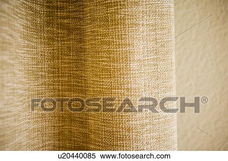 Stock Photography - Ripple in natural woven curtain. Fotosearch
