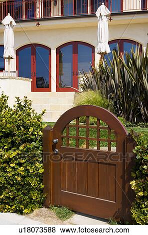 Wood front gate to home View Large Photo Image Stock Photo - Wood front gate to home. Fotosearch