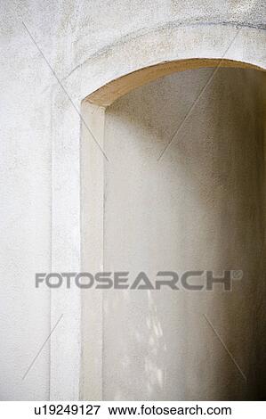 Stock Photo - Arched Exterior Stucco Doorway. Fotosearch