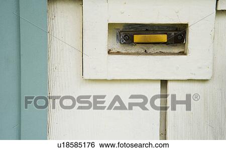 Stock Photograph - Detail of old Yellow Doorbell. Fotosearch