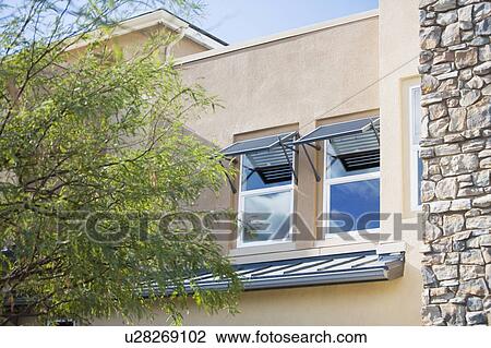 Stock Image - Exterior shot of contemporary homes. Fotosearch