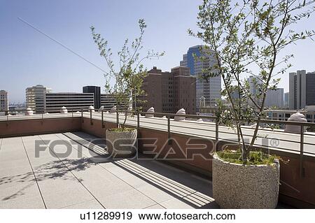 Stock Photo - Outdoor patio with view of city.. Fotosearch