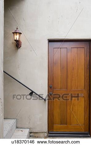 Vignette of door, light and handrail. View Large Photo Image Stock Photograph - Vignette of door, light and handrail.. Fotosearch