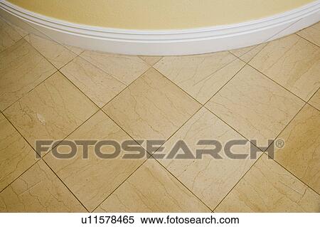 Stock Photography - Detail of Curved Wall and Tile Floor. Fotosearch