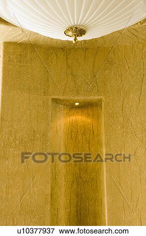 Large Ceiling Lamp and Gold Textured Wall View Large Photo Image Stock Photo - Large Ceiling Lamp and Gold Textured Wall. Fotosearch