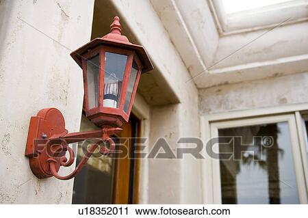 Detail of red wall light. View Large Photo Image Stock Image - Detail of red wall light.. Fotosearch