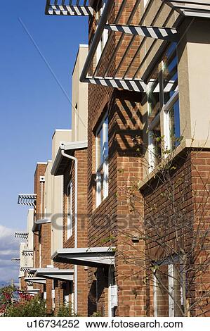 Stock Image - Exterior Shot of Contemporary Condominiums/Homes. Fotosearch