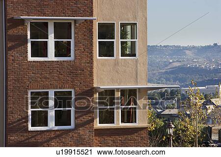 Exterior shot of Contemporary Condominiums/Homes View Large Photo Image Stock Image - Exterior shot of Contemporary Condominiums/Homes. Fotosearch
