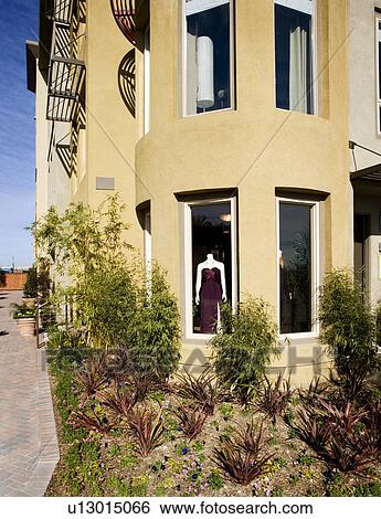 Exterior shot of yellow stucco store View Large Photo Image Stock Photograph - Exterior shot of yellow stucco store . Fotosearch