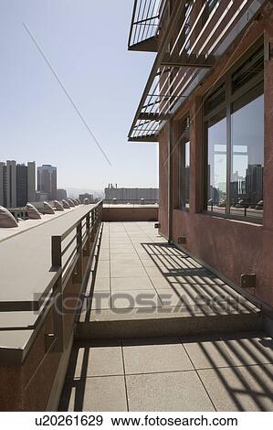 Modern overhang with view of cityscape. View Large Photo Image Stock Photo - Modern overhang with view of cityscape.. Fotosearch