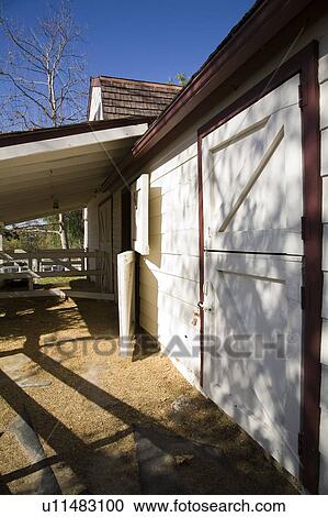Red and white stable exterior View Large Photo Image Stock Image - Red and white stable exterior. Fotosearch