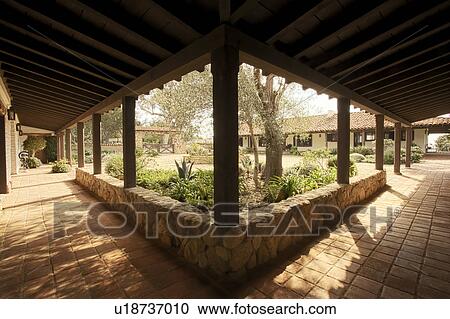 Spanish style outdoor corridors View Large Photo Image Stock Image - Spanish style outdoor corridors. Fotosearch
