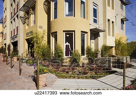 Yellow stucco store front View Large Photo Image Stock Image - Yellow stucco store front. Fotosearch