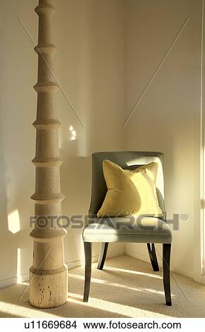 Picture - Chair and Wood Carving Statue. Fotosearch