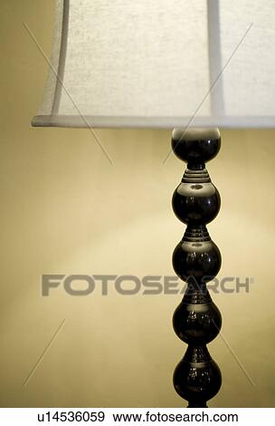 Stock Photo - Contemporary Black Lamp with White Shade. Fotosearch