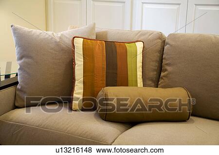 Couch and striped pillow View Large Photo Image Stock Photo - Couch and striped pillow. Fotosearch