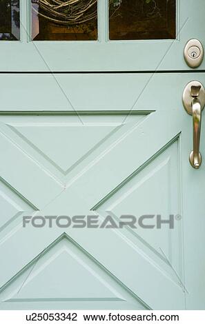 Stock Image - Detail of Aqua Dutch Door. Fotosearch