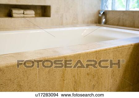 Detail of bathtub and towels. View Large Photo Image Picture - Detail of bathtub and towels.. Fotosearch