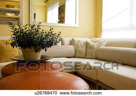 Stock Image - Detail of Contemporary Sofa in Living Room. Fotosearch