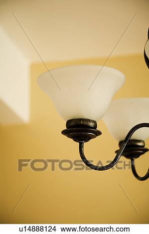 Light fixture and yellow wall View Large Photo Image Picture - Light fixture and yellow wall. Fotosearch