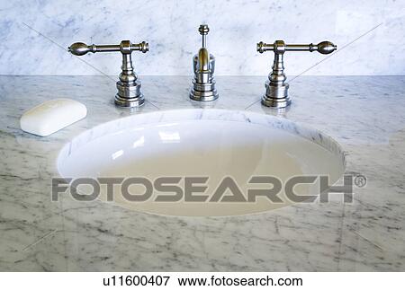 Marble Countertop with Chrome Faucet and Bar of Soap View Large Photo Image Stock Photo - Marble Countertop with Chrome Faucet and Bar of Soap. Fotosearch