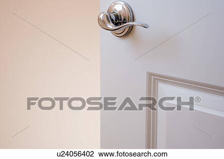 Stock Image - Open door handle. Fotosearch