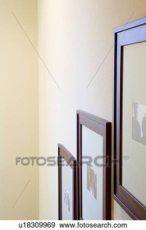 Stock Photo - Picture Frames on Wall. Fotosearch