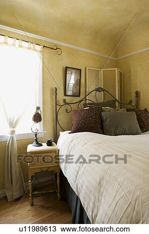 Vignette of naturally lit bedroom View Large Photo Image Stock Image - Vignette of naturally lit bedroom. Fotosearch