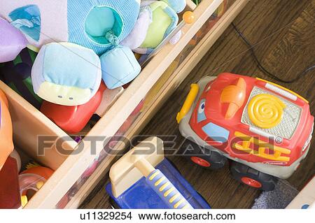 Picture - Detail of a bin of baby toys. Fotosearch