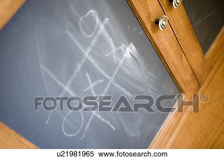 Detail of chalkboard with wiped away tic tac toe game. View Large Photo Image Stock Photography - Detail of chalkboard with wiped away tic tac toe game.. Fotosearch