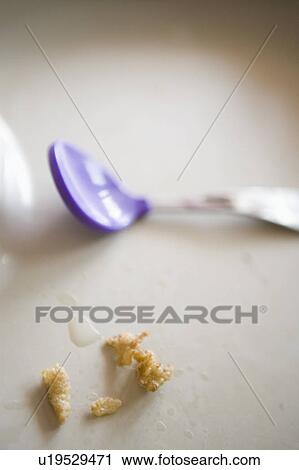 Detail of dirty high chair tray with baby spoon View Large Photo Image Stock Image - Detail of dirty high chair tray with baby spoon. Fotosearch