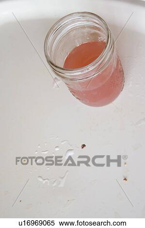 Detail of dirty high chair tray with glass of pink lemonade View Large Photo Image Stock Photography - Detail of dirty high chair tray with glass of pink lemonade. Fotosearch