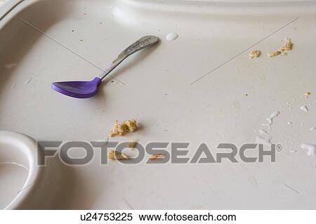 Detail of dirty high chair tray with baby spoon View Large Photo Image Stock Photography - Detail of dirty high chair tray with baby spoon. Fotosearch