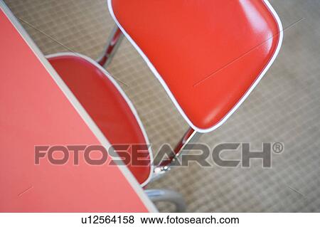 Detail of red childrens chair, high angle View Large Photo Image Stock Photo - Detail of red childrens chair, high angle. Fotosearch