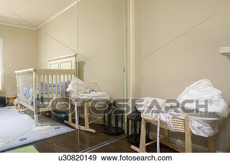 Interior of a baby room with mirrored closet doors View Large Photo Image Stock Photo - Interior of a baby room with mirrored closet doors. Fotosearch