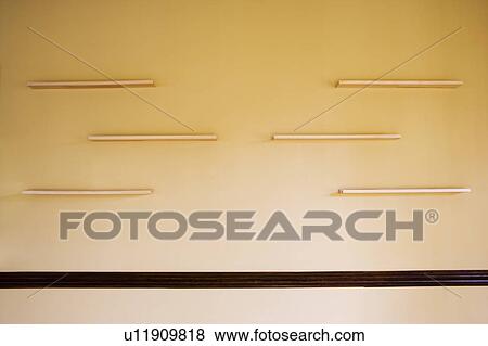 Built in shelving on beige wall View Large Photo Image Stock Photo - Built in shelving on beige wall. Fotosearch