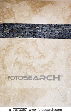 Stock Photo - Detail of Unique Bathroom Tile with Stones. Fotosearch