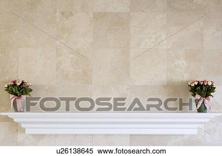Stock Photography - Pink Roses on Fireplace Mantle. Fotosearch