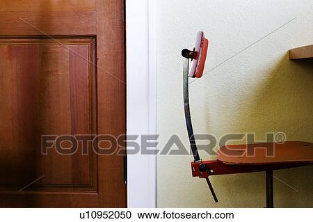 Stock Image - Contemporary Red Chair at Desk. Fotosearch