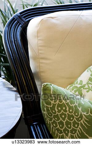 Green Print Pillow on Wicker Chair with White Cushions View Large Photo Image Stock Image - Green Print Pillow on Wicker Chair with White Cushions. Fotosearch