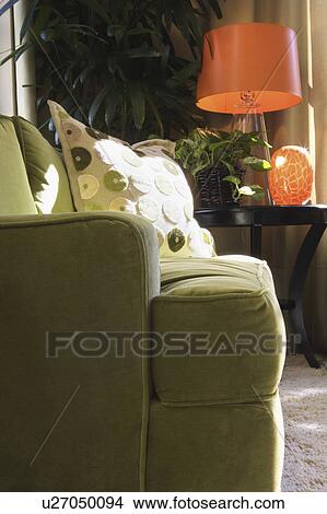 Green sofa in living room View Large Photo Image Picture - Green sofa in living room. Fotosearch