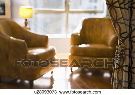 Leatehr Armchairs and Patterened Curtain View Large Photo Image Stock Image - Leatehr Armchairs and Patterened Curtain. Fotosearch