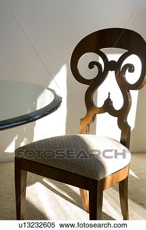 Ornate Wood Chair at Glass Table View Large Photo Image Stock Photography - Ornate Wood Chair at Glass Table. Fotosearch