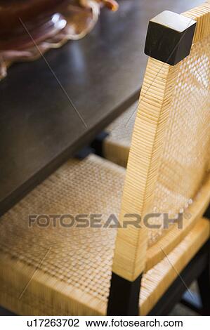 Wicker dining chair View Large Photo Image Stock Image - Wicker dining chair. Fotosearch