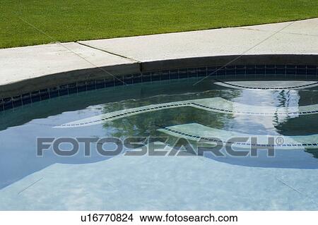 Detail of backyard swimming pool View Large Photo Image Picture - Detail of backyard swimming pool. Fotosearch