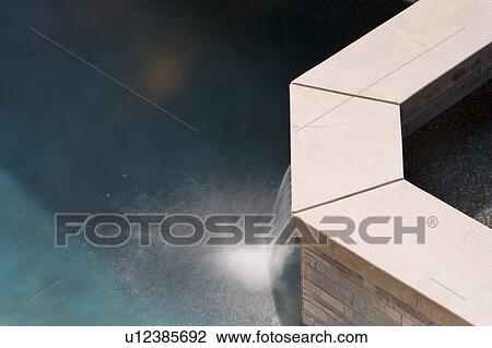 Stock Image - Detail of Modern Swimming Pool and Jacuzzi. Fotosearch