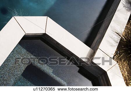 Stock Photography - Detail of Modern Swimming Pool and Jacuzzi. Fotosearch