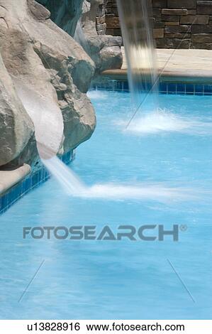 Rock Waterfall to Swimming Pool View Large Photo Image Stock Photograph - Rock Waterfall to Swimming Pool. Fotosearch