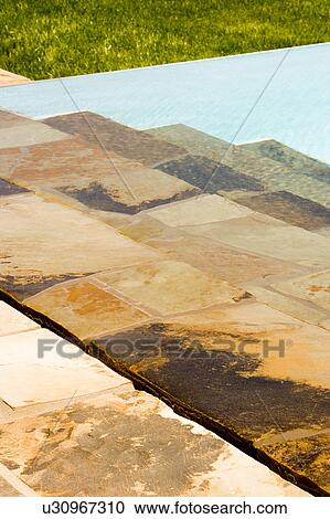 Swimming Pool and Stone Tiles View Large Photo Image Stock Image - Swimming Pool and Stone Tiles. Fotosearch